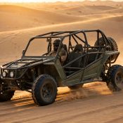 Dune buggy driving on Dubai desert sand